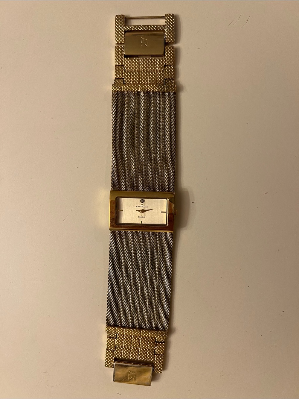 Anne Klein 10/7238 rose gold bracelet watch w/crystal bezel & mother pearl dial.